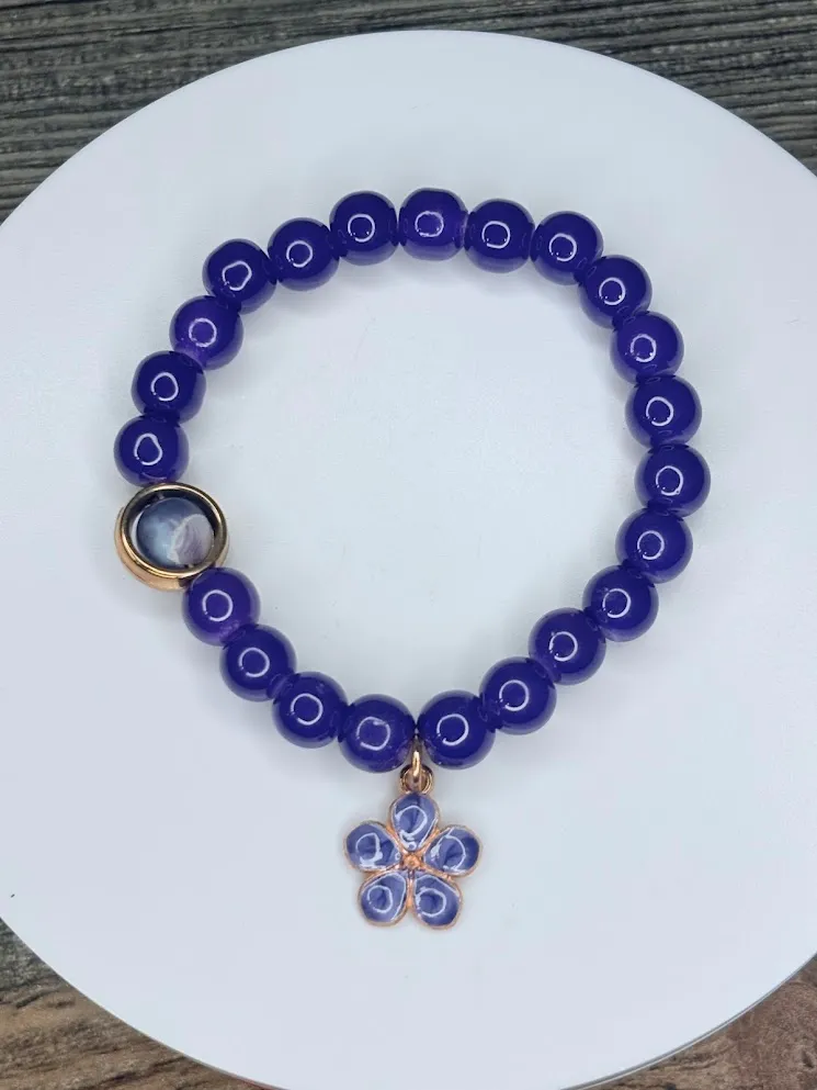 Purple flower bracelet — handmade bracelet by Beadiverse