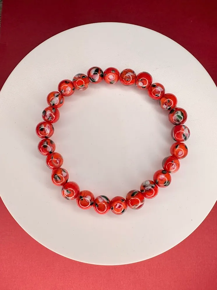 Red blossom bracelet — handmade bracelet by Beadiverse