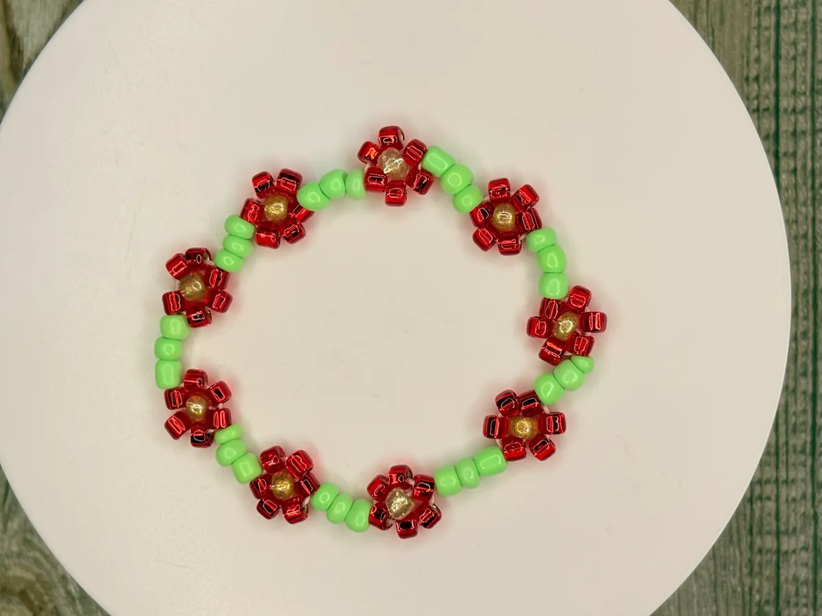 Poinsettia — handmade bracelet by Beadiverse
